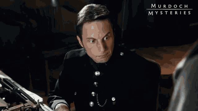 a murdoch mysteries poster with a man in a black uniform