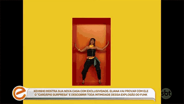 a woman is standing in a red box on a yellow background with a sbt logo in the corner