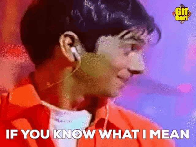 a man wearing headphones and an orange shirt is saying if you know what i mean .