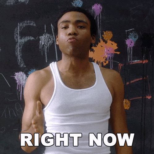 a man in a white tank top giving a thumbs up with the words right now below him