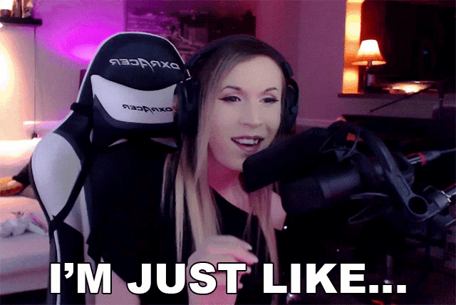a woman sitting in front of a microphone with the words i 'm just like below her