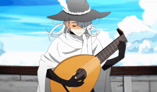 a man in a hat is playing a guitar
