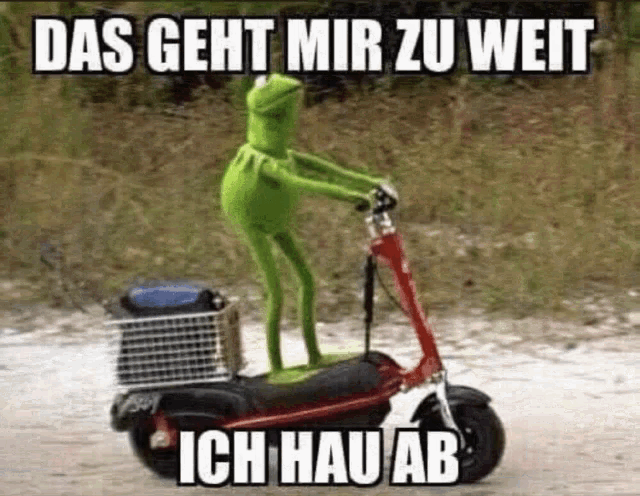 kermit the frog is riding a scooter on a dirt road with a basket on the back .