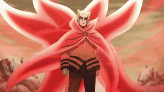a man in a red cape is standing in front of a large red flower