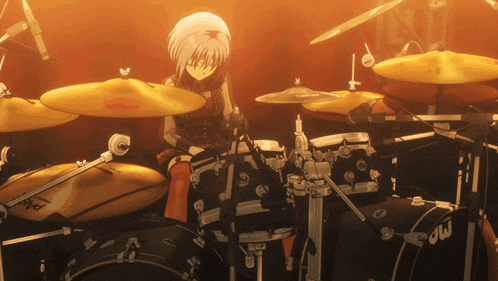 a person playing drums with a drum set that says dw on it