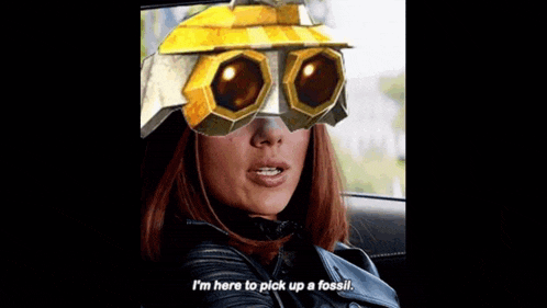 a woman is wearing a pair of glasses that say `` i 'm here to pick up a fossil `` .
