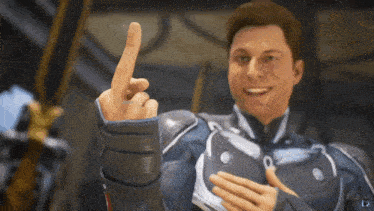 a man in a superhero suit is pointing his finger at the camera