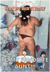 a man in a bikini is dancing in front of a cake and balloons .