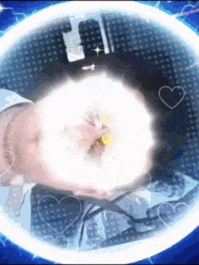 a person 's face is surrounded by a white circle with a heart in the middle