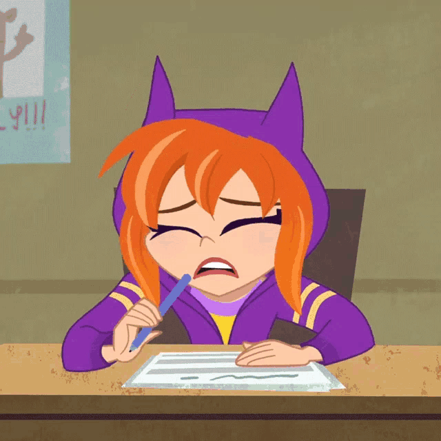 a girl in a purple hoodie is writing on a piece of paper with a pen