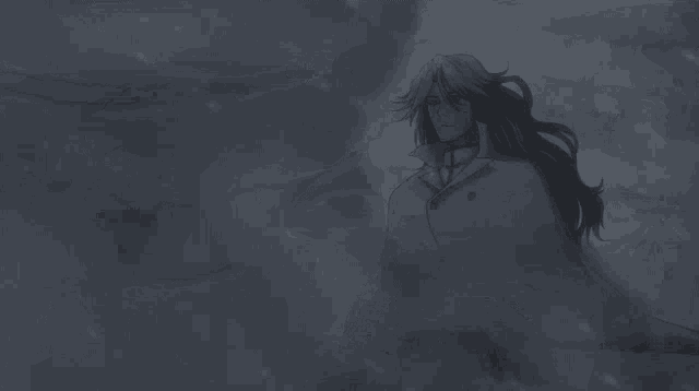 a man with long hair and a cape stands in the rain
