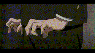 a man in a suit is holding another man 's hand in his pocket