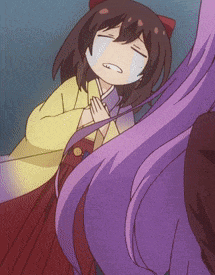 a girl with purple hair is crying in a yellow shirt