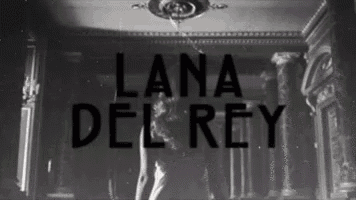 a black and white photo of lana del rey dancing in a room