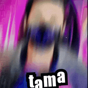 a close up of a person 's face with the word tama written on it