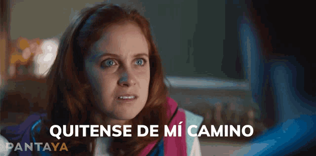 a woman says quitense de mi camino in a foreign language