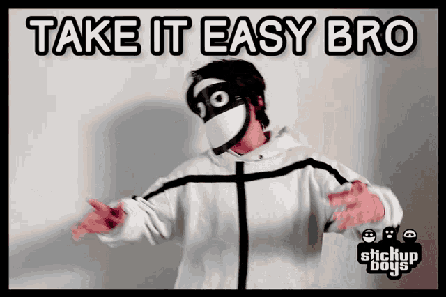 a man wearing a mask is dancing with the words take it easy bro above him