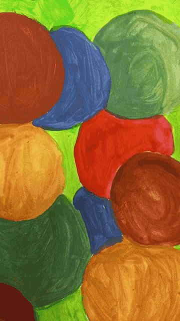 a colorful painting of circles on a green background