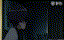 a close up of two white circles on a black background with dots .