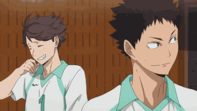 a couple of anime characters one with the number 1 on their shirt