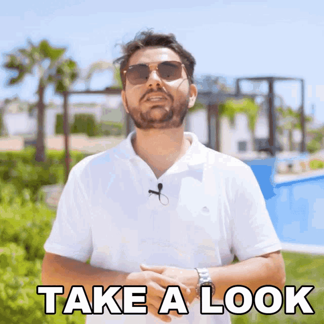 a man wearing sunglasses and a white polo shirt says " take a look "