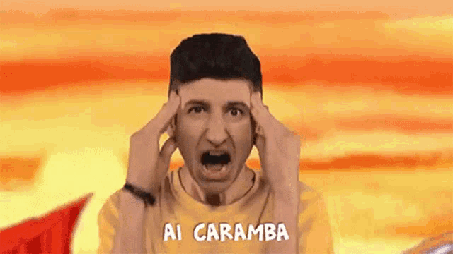 a man in a yellow shirt is making a funny face and the words ai caramba are above him