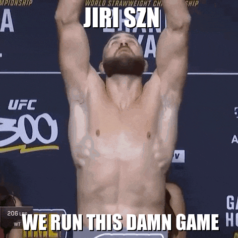 a shirtless man stands in front of a sign that says ufc
