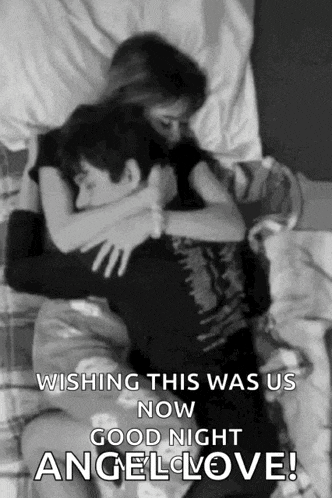 a black and white photo of a man and a woman hugging each other .