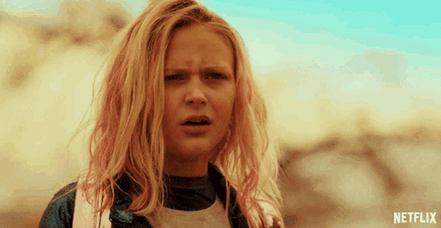a girl with pink hair and a netflix logo on the bottom right