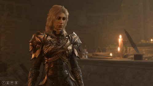 a woman in armor stands in a dark room