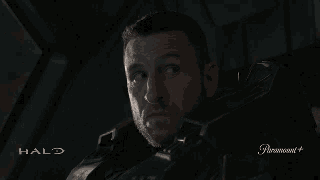 a man in a halo armor sits down