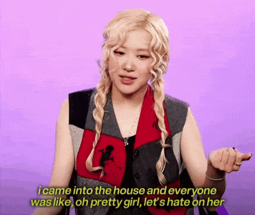 a woman with blonde hair says i came into the house and everyone was like oh pretty girl let 's hate on her .