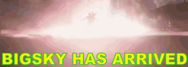 a big sky has arrived sign with a pink background