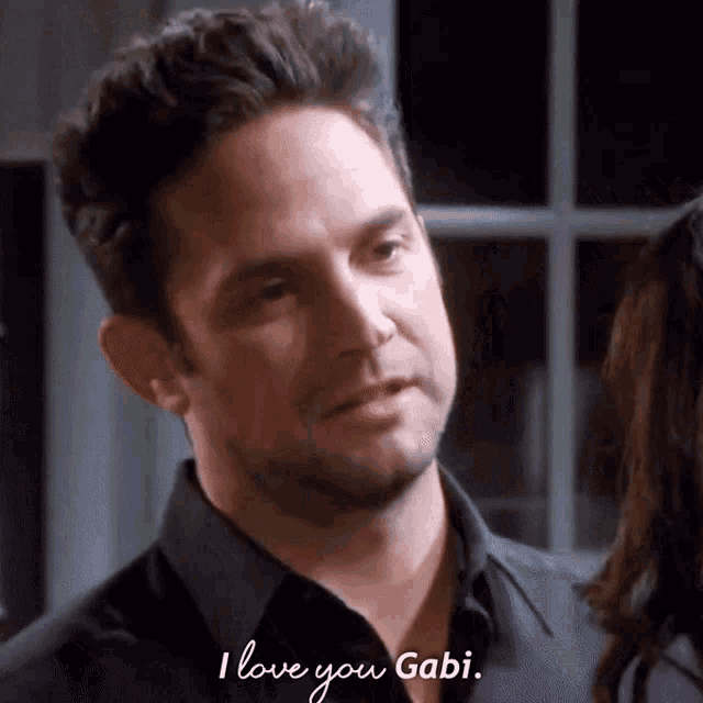 a man says " i love you gabi " to a woman