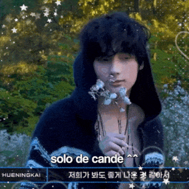 a man with a flower in his mouth and the words solo de cande behind him