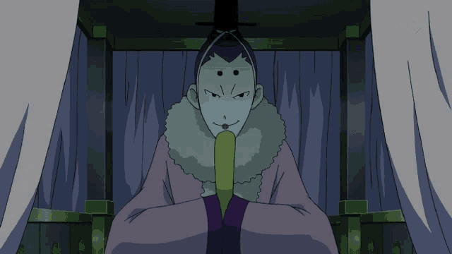 a cartoon character is sitting in front of a screen that says tv tokyo