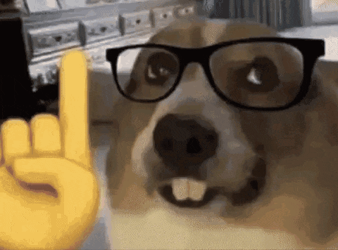 a dog wearing glasses and a yellow hand giving a rock and roll sign .