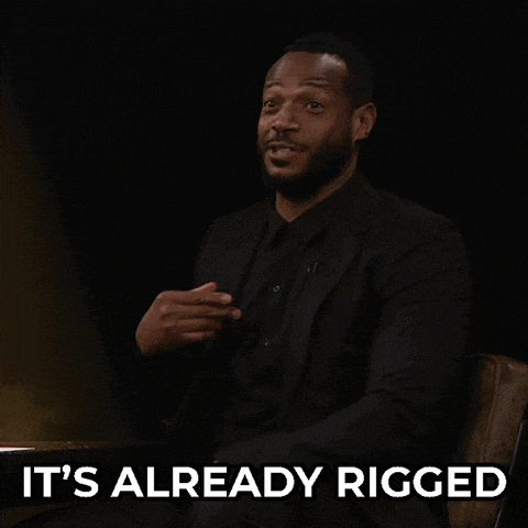 a man in a suit says it 's already rigged with his hands
