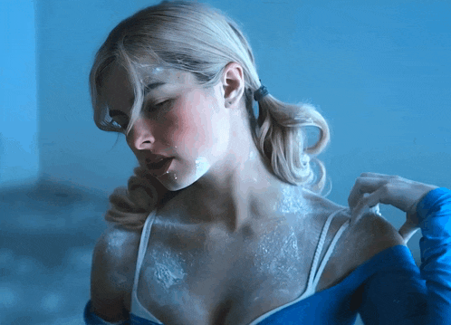 a woman with white powder on her face