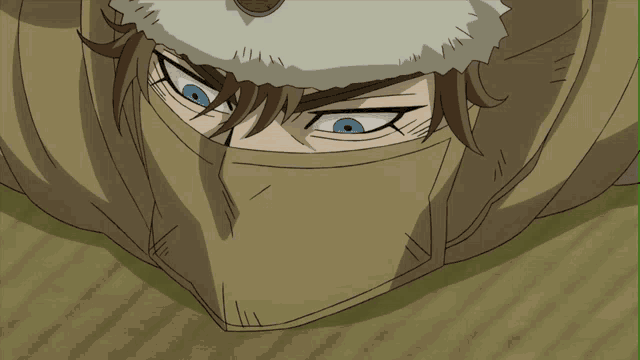 a close up of a person 's face with a mask on