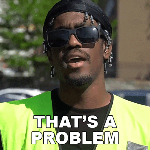 a man wearing sunglasses and a yellow vest says that 's a problem ..