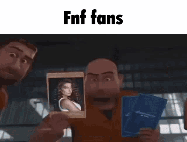 a man is holding a card with a picture of a sheep on it in his hand .