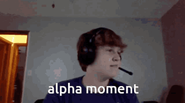 a boy wearing headphones says alpha moment