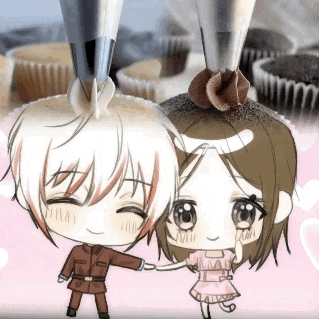 a boy and a girl are holding hands in front of cupcakes being decorated