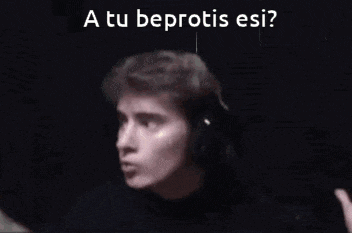 a blurred image of a man with the words " a tu beprotis esi " written above him