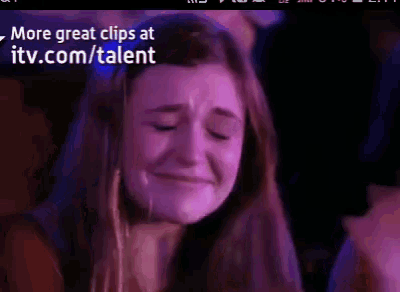 a woman is crying with a purple background and the words more great clips at itv.com / talent