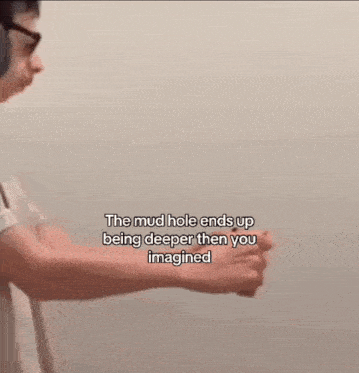 a man wearing headphones holds his fist up and says the mud hole ends up being deeper than you imagined .