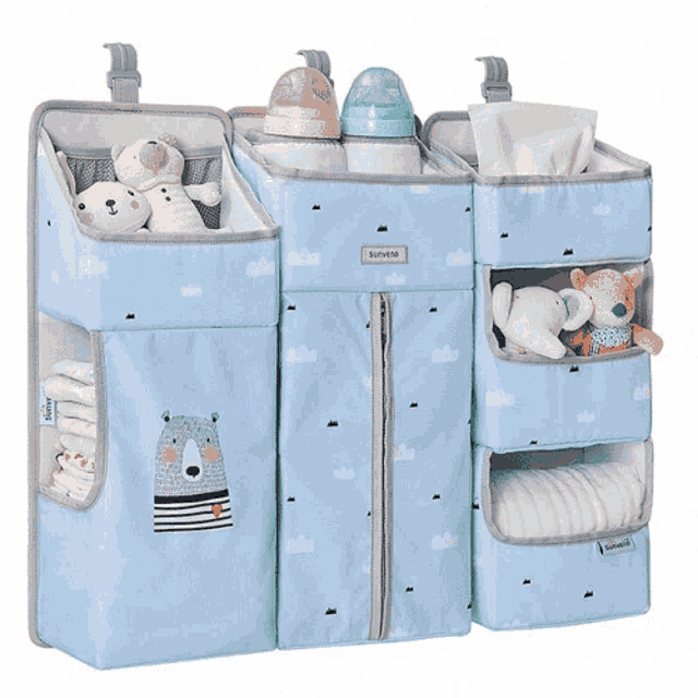 a baby crib organizer with a bear on the front