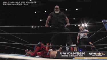 a man in a wrestling ring with the words njpw world on the bottom