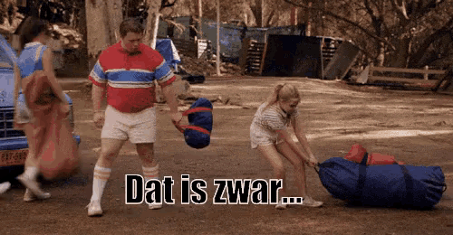 a man and a woman are pushing a large bag that says dat is zwar on it